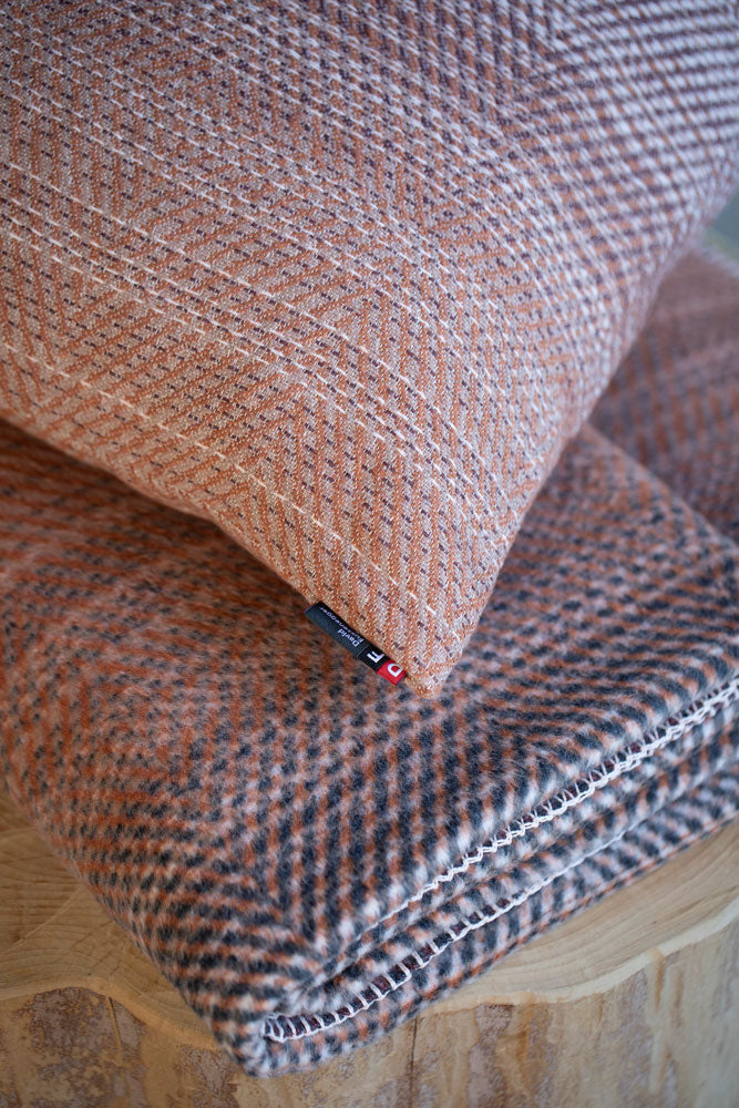 SAVONA throw "gradient herringbone" in . Throw Blanket made by David Fussenegger , a family-run mill in Austria.