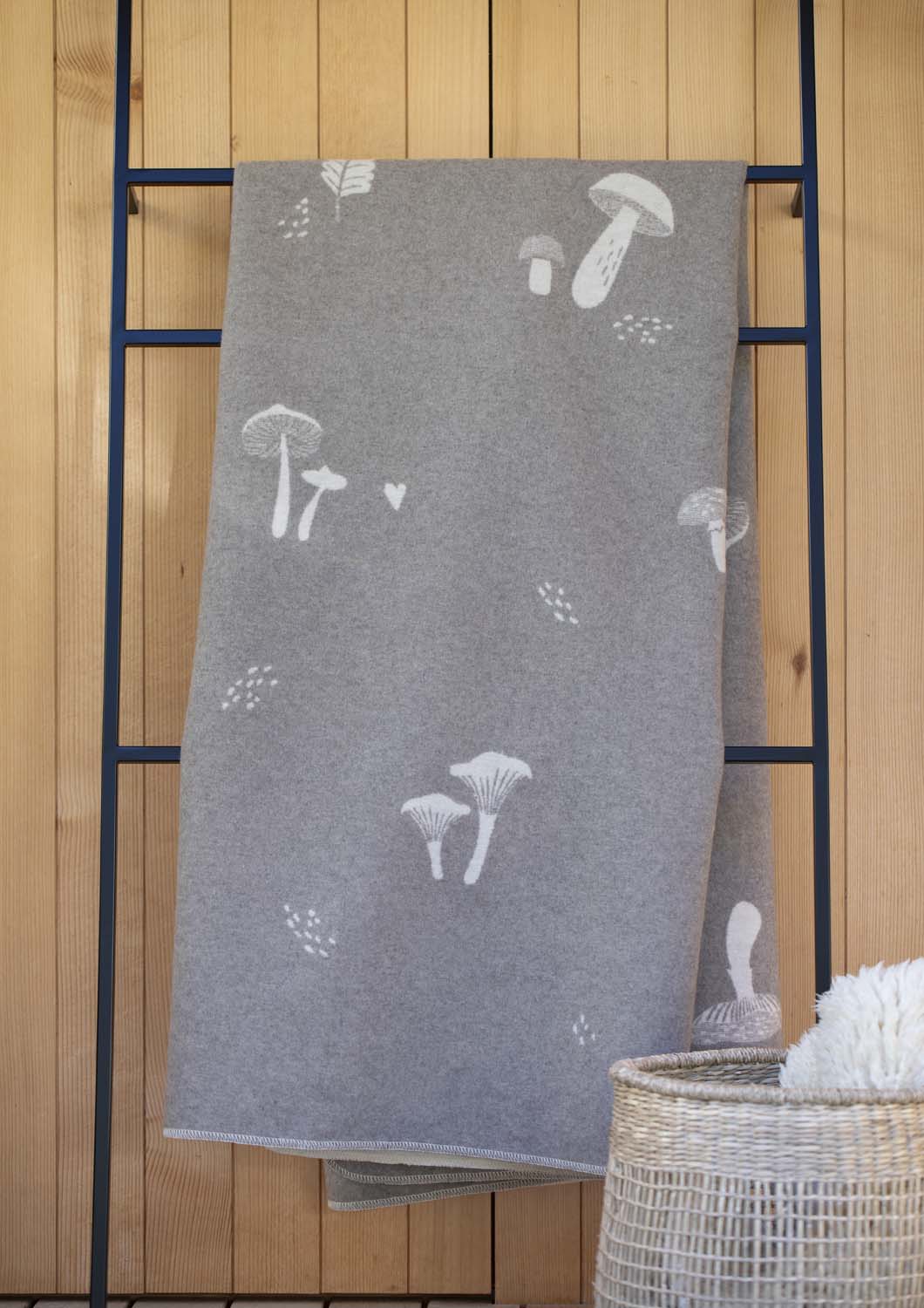 SILVRETTA throw "mushrooms'n more" in . Throw Blanket made by David Fussenegger , a family-run mill in Austria.