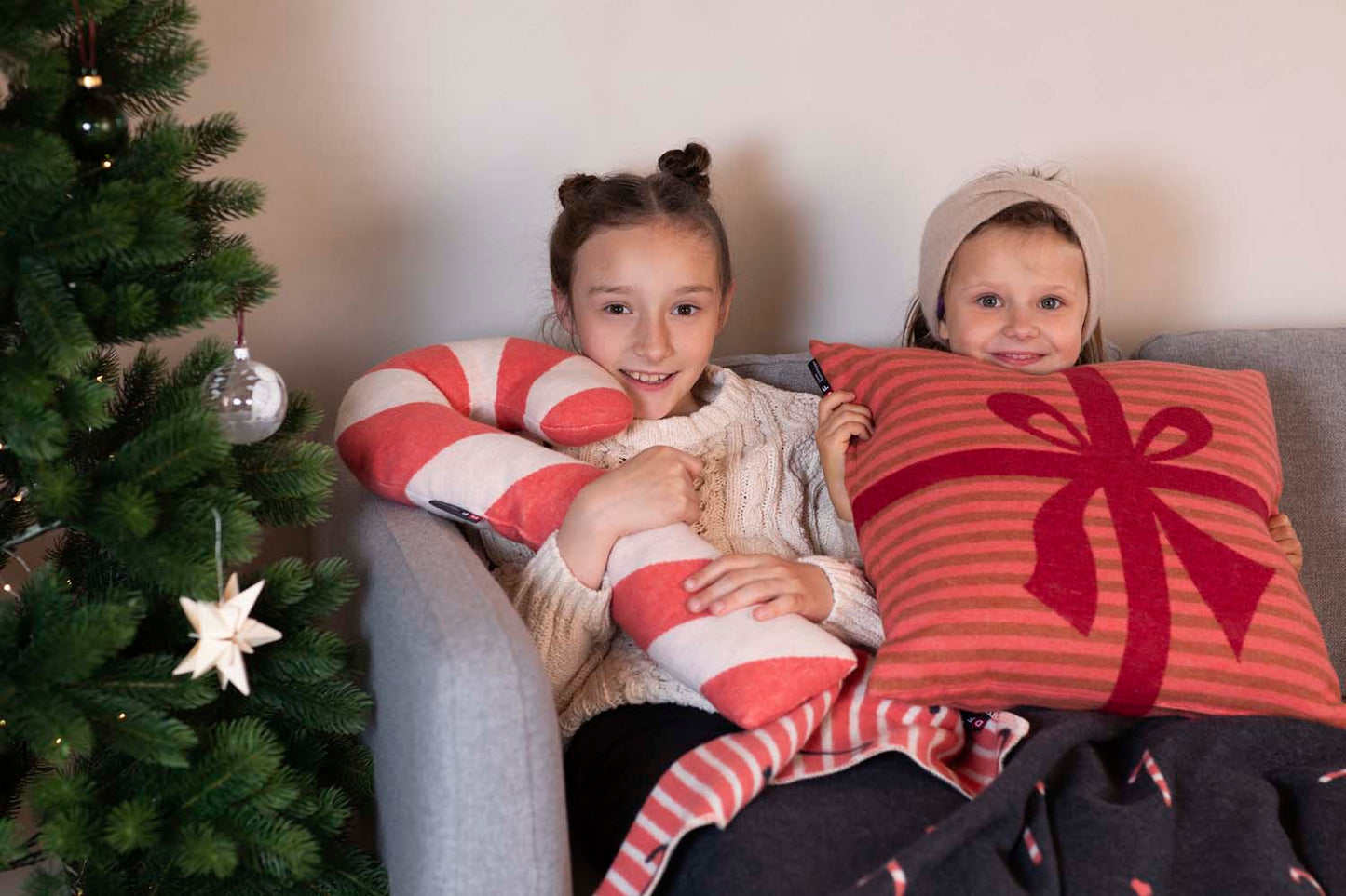 SILVRETTA pillow "present" in . Filled Cushion made by David Fussenegger , a family-run mill in Austria.