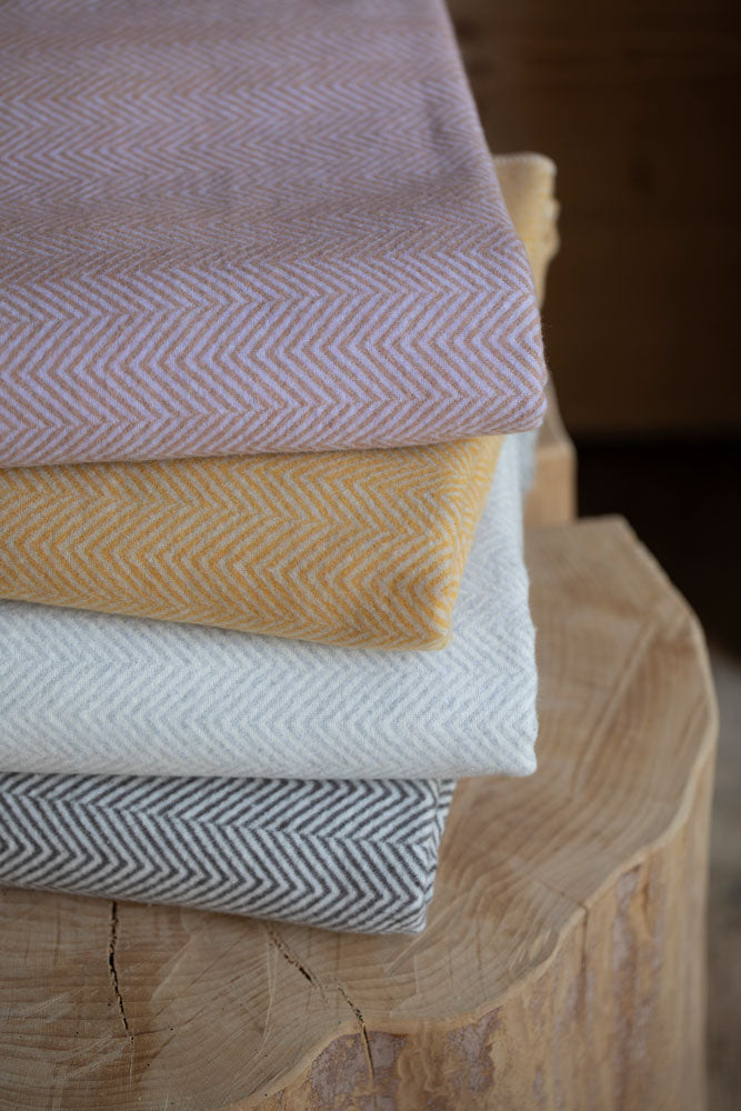 SILVRETTA throw "herringbone" in . Throw Blanket made by David Fussenegger , a family-run mill in Austria.