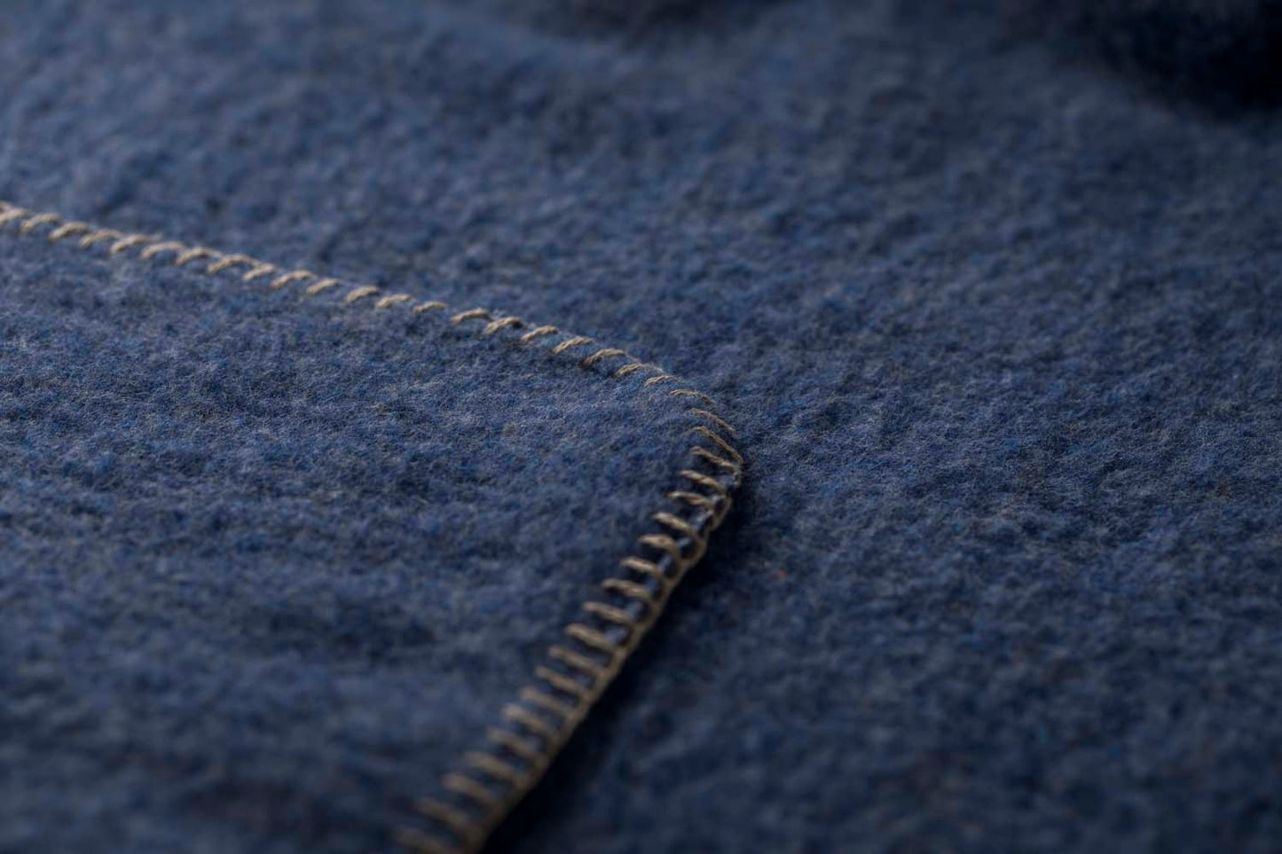 MERANO throw "faux solid"