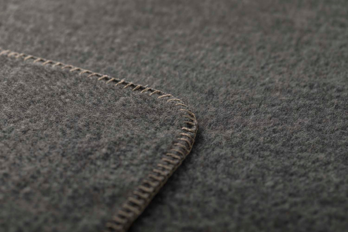 MERANO throw "faux solid"