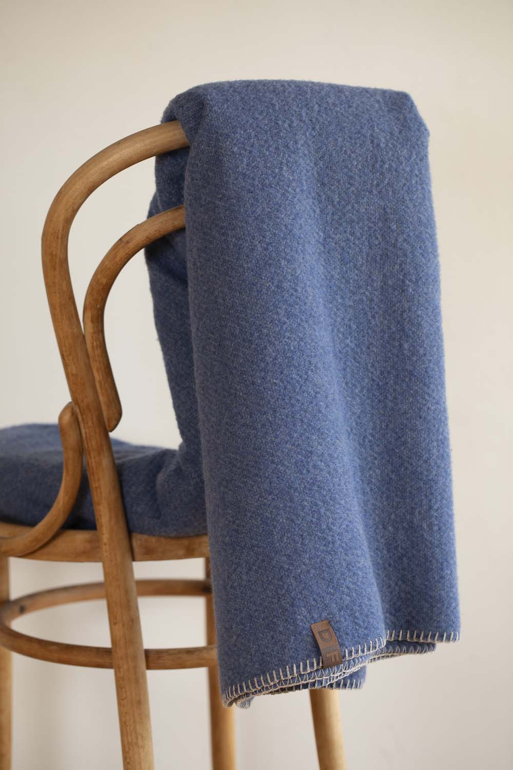 MERANO throw "faux solid"