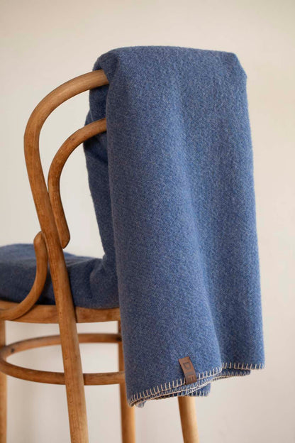 MERANO throw "faux solid"