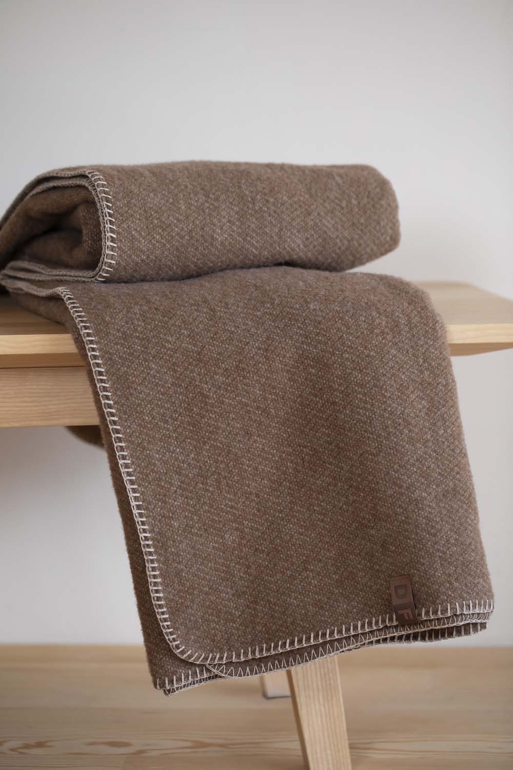 MERANO throw "faux solid"