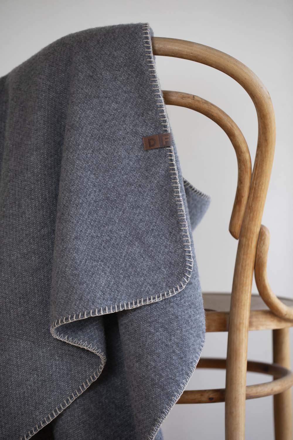 MERANO throw "faux solid"