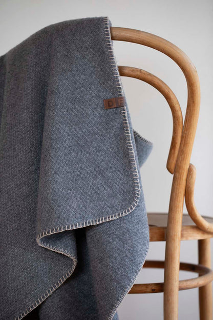 MERANO throw "faux solid"