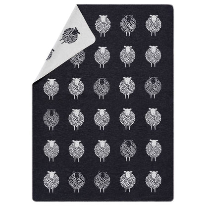 SILVRETTA Throw "Sheep" in anthracite . Throw Blanket made by David Fussenegger , a family-run mill in Austria.