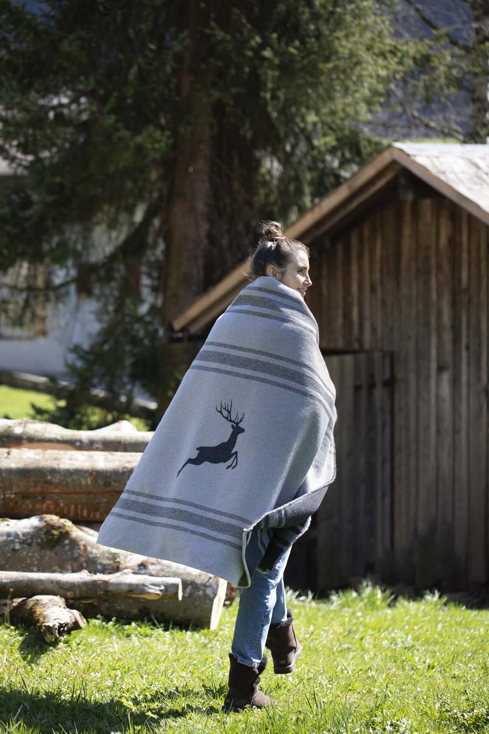 LUCA throw flannel "jumping stag / stripes" in . Throw Blanket made by David Fussenegger , a family-run mill in Austria.