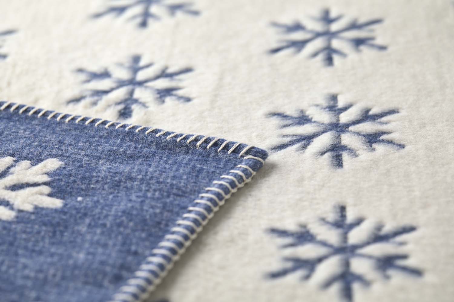 CARLA throw plaid "snowflake" in . Throw Blanket made by David Fussenegger , a family-run mill in Austria.