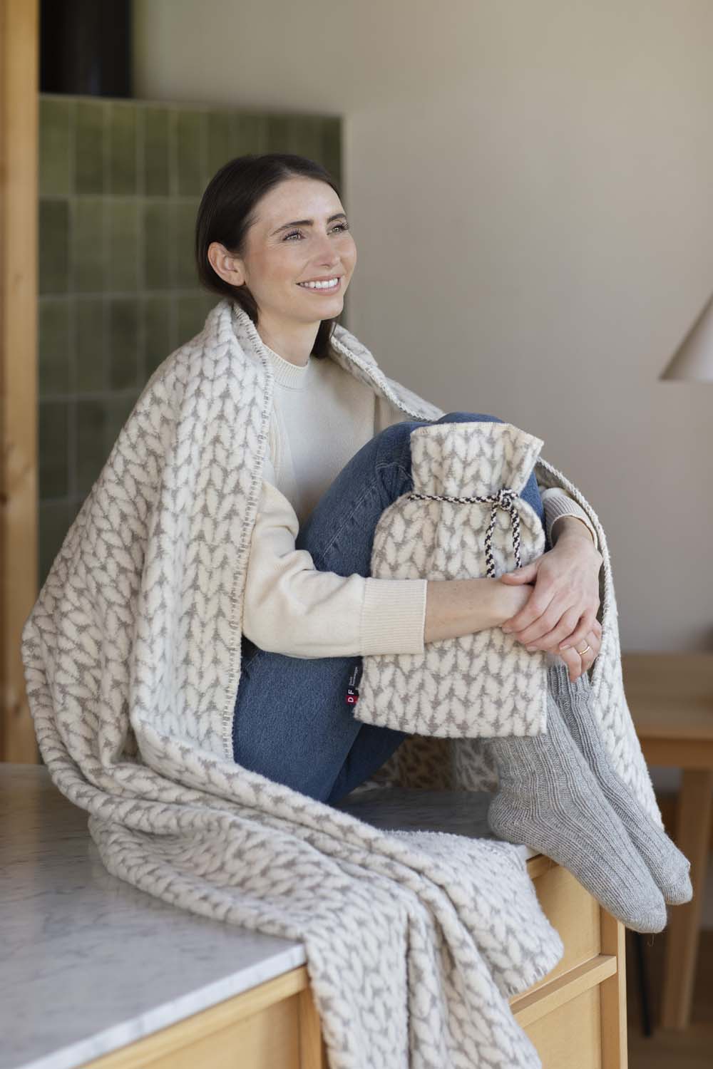 SILVRETTA warming bottle "knitted" in . Warming Bottle made by David Fussenegger , a family-run mill in Austria.