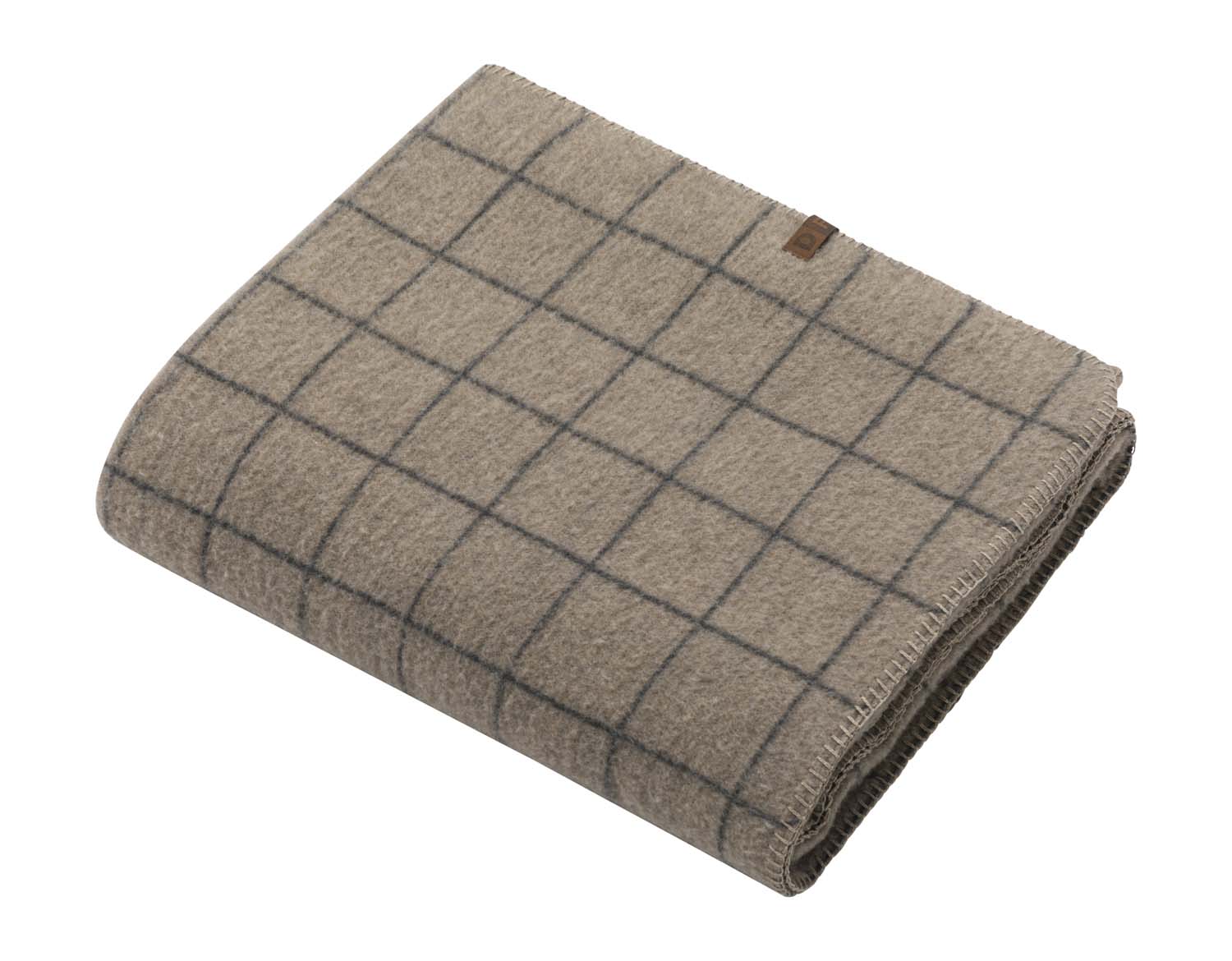 MERANO throw "checkered" in . made by INDIGO 11 , a family-run mill in Austria.