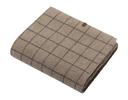 MERANO throw "checkered" in . made by INDIGO 11 , a family-run mill in Austria.