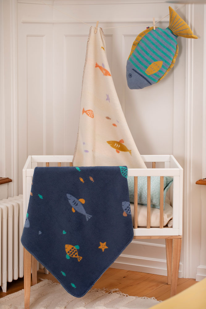 MILA baby blanket "school of fish" in . Blanket made by David Fussenegger , a family-run mill in Austria.