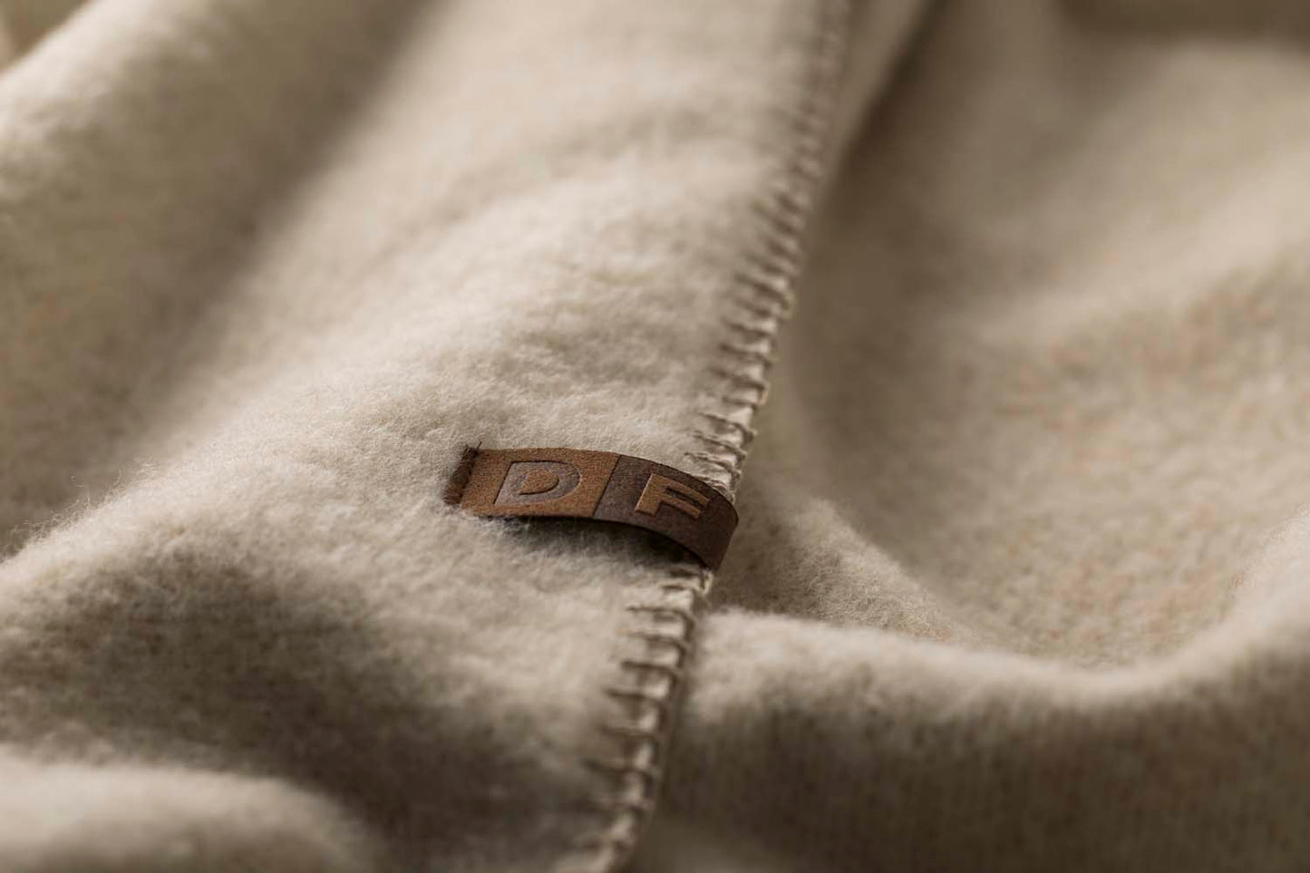 MERANO throw "faux solid"