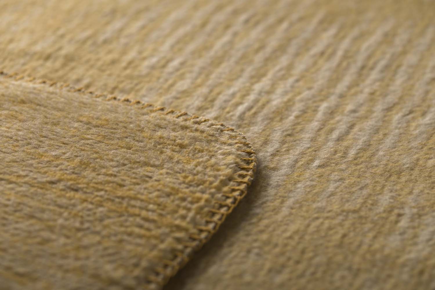 SAVONA throw "structures" in . Throw Blanket made by David Fussenegger , a family-run mill in Austria.