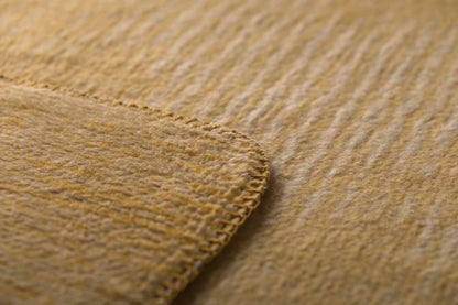 SAVONA throw "structures" in . Throw Blanket made by David Fussenegger , a family-run mill in Austria.