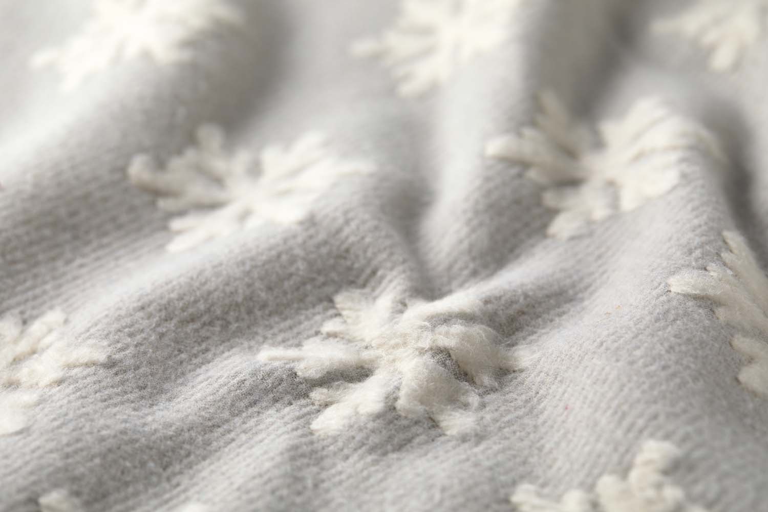 CARLA throw plaid "snowflake" in . Throw Blanket made by David Fussenegger , a family-run mill in Austria.