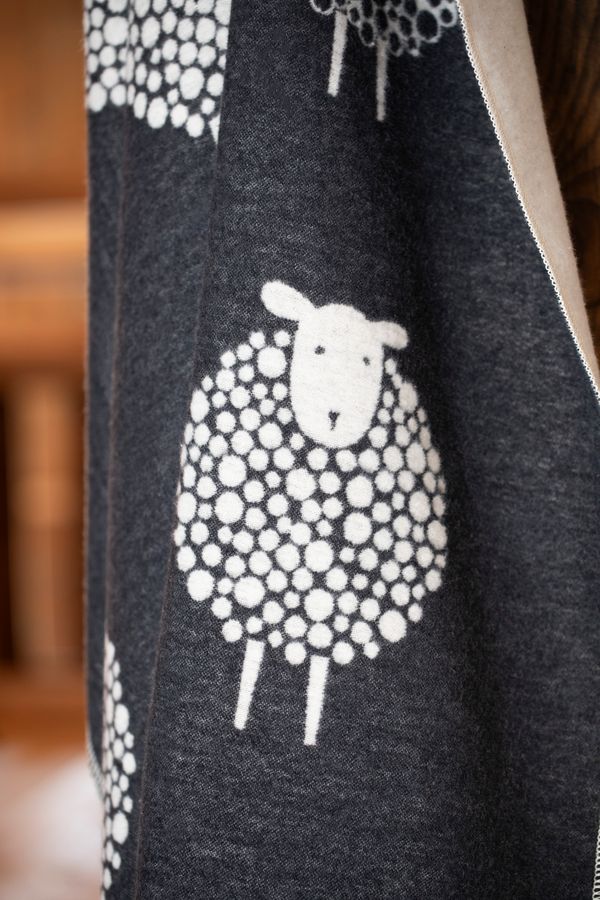 SILVRETTA Throw "Sheep" in . Throw Blanket made by David Fussenegger , a family-run mill in Austria.