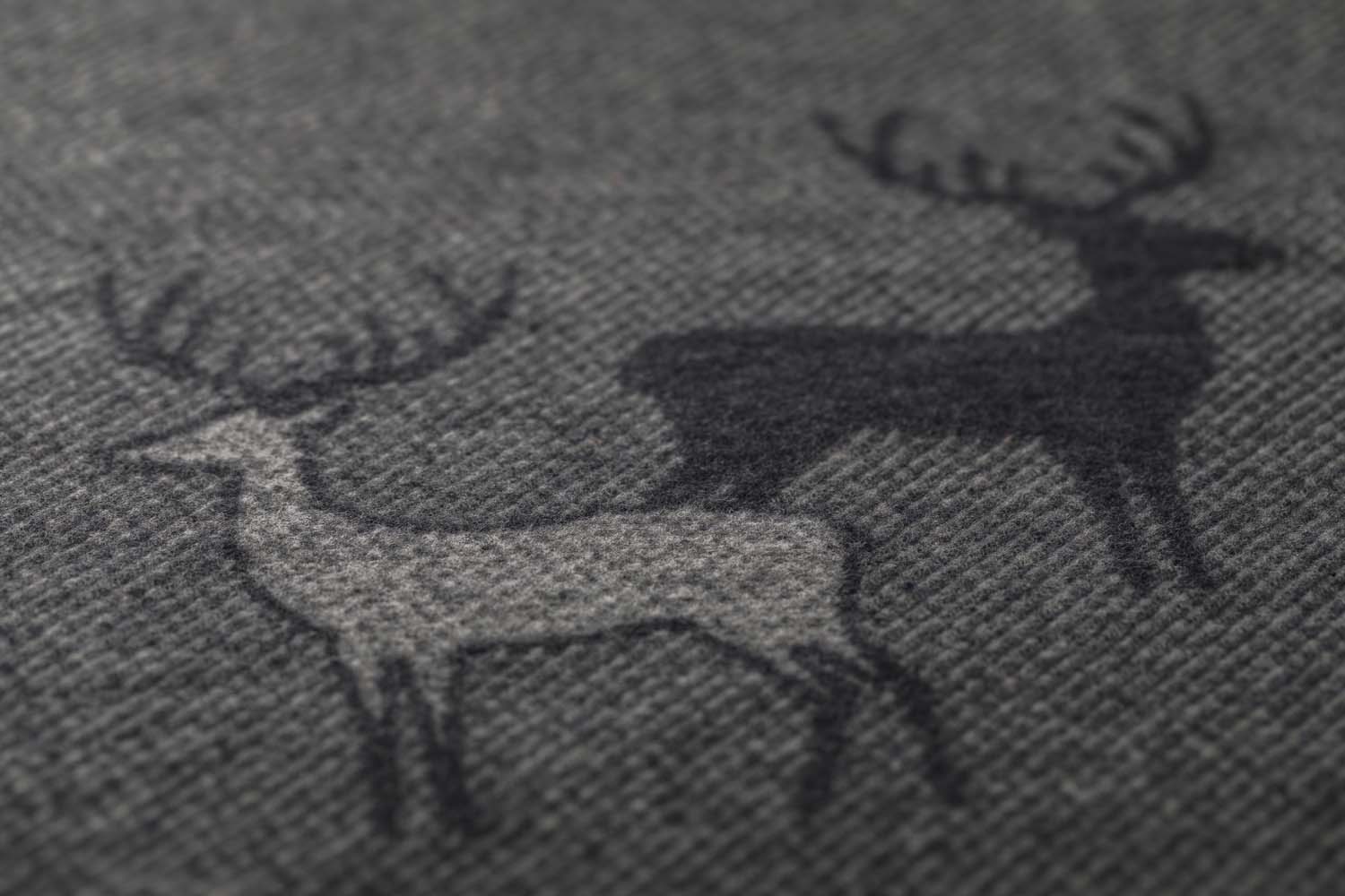 LUCA throw "pairs of stags" in . Throw Blanket made by David Fussenegger , a family-run mill in Austria.