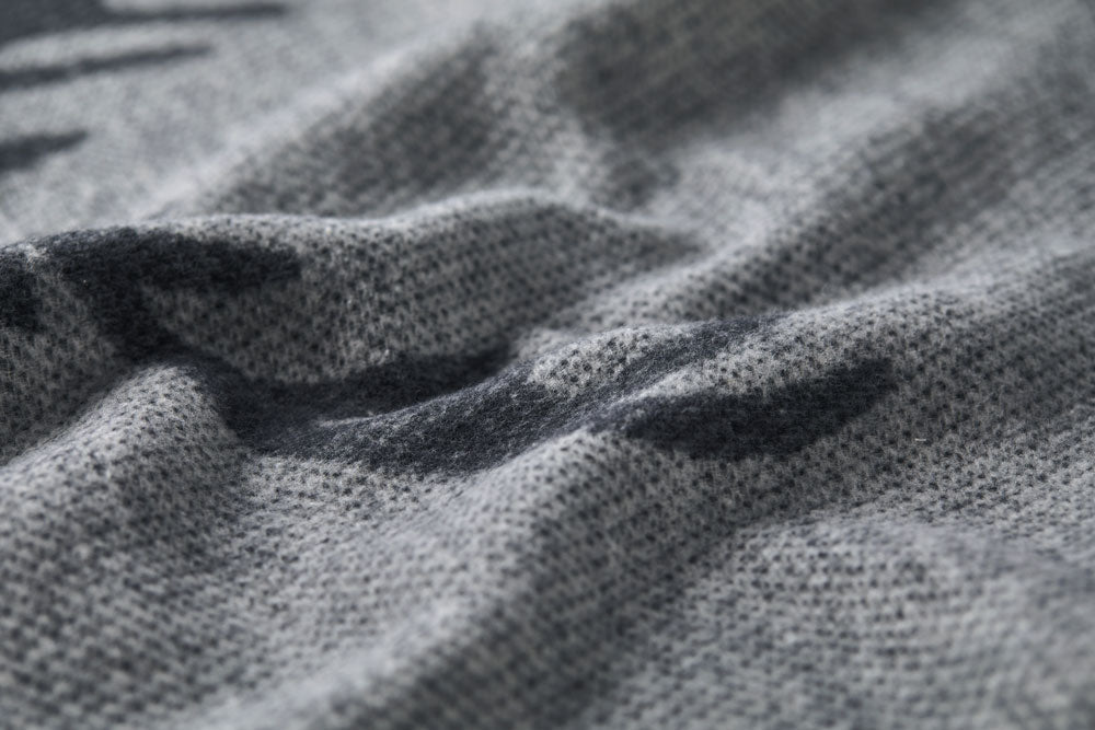 LUCA throw "centered deer" in . Throw Blanket made by David Fussenegger , a family-run mill in Austria.