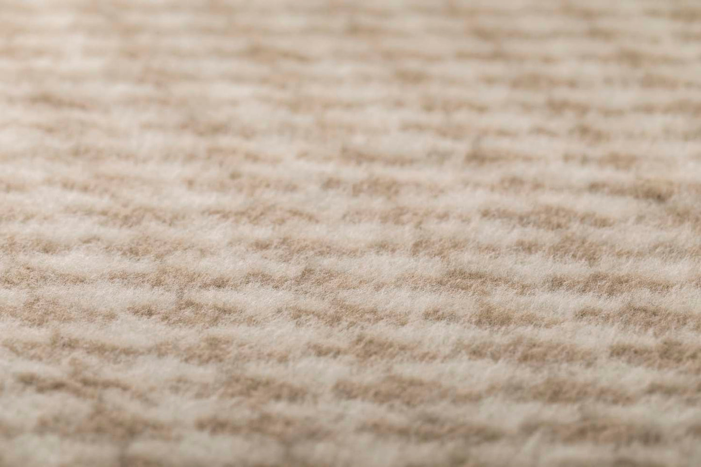 MERANO throw "houndstooth" in . made by INDIGO 11 , a family-run mill in Austria.