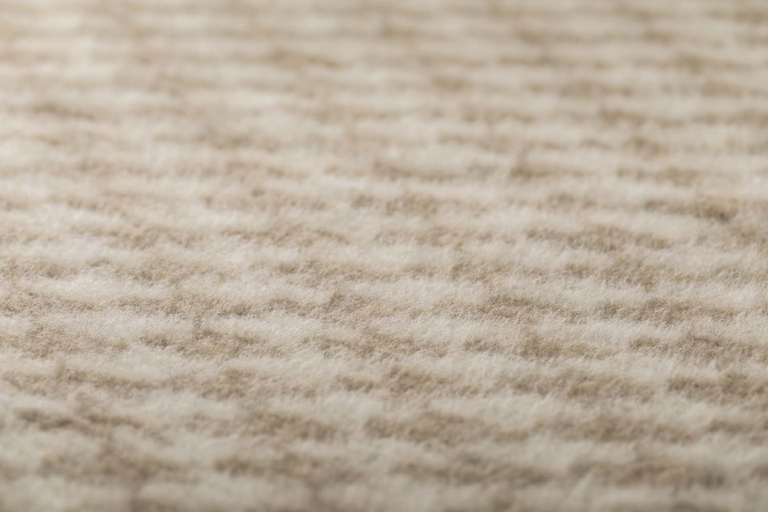 MERANO throw "houndstooth" in . made by INDIGO 11 , a family-run mill in Austria.