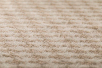 MERANO throw "houndstooth" in . made by INDIGO 11 , a family-run mill in Austria.