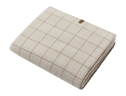 MERANO throw "checkered" in . made by INDIGO 11 , a family-run mill in Austria.