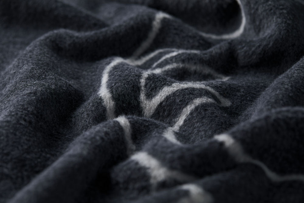 SAVONA throw "stag heads linear" in . Throw Blanket made by David Fussenegger , a family-run mill in Austria.