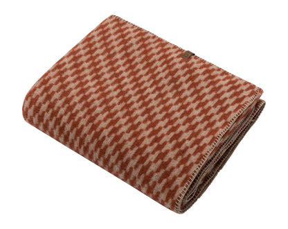 MERANO throw "houndstooth" in . made by INDIGO 11 , a family-run mill in Austria.