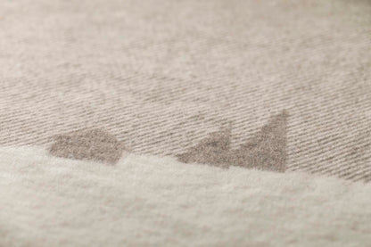 LUCA throw "mountains & moon" in . Throw Blanket made by David Fussenegger , a family-run mill in Austria.