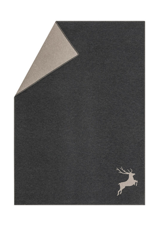 SYLT throw "stag" in charcoal . Throw Blanket made by David Fussenegger , a family-run mill in Austria.