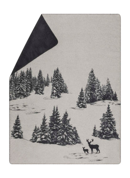 SAVONA throw "snowy trees/stag" in grey . Throw Blanket made by David Fussenegger , a family-run mill in Austria.