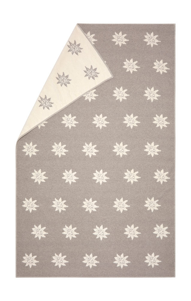 CARLA throw "Edelweiß" in smoke . Throw Blanket made by David Fussenegger , a family-run mill in Austria.