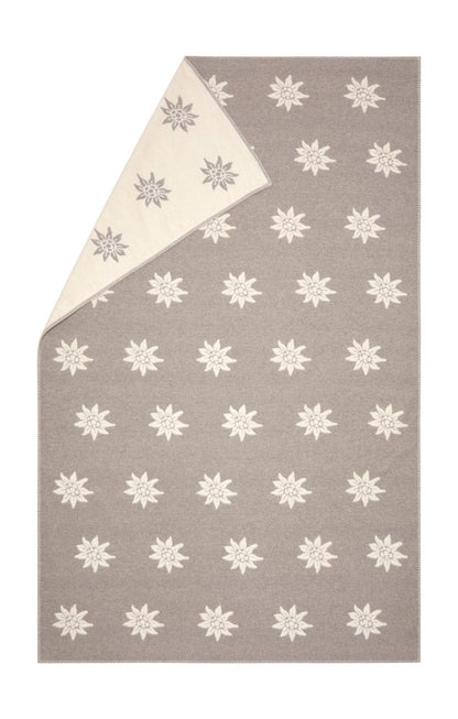 CARLA throw "Edelweiß" in smoke . Throw Blanket made by David Fussenegger , a family-run mill in Austria.