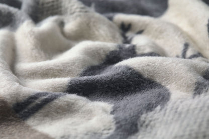 SAVONA throw "mountains modern" in . Throw Blanket made by David Fussenegger , a family-run mill in Austria.