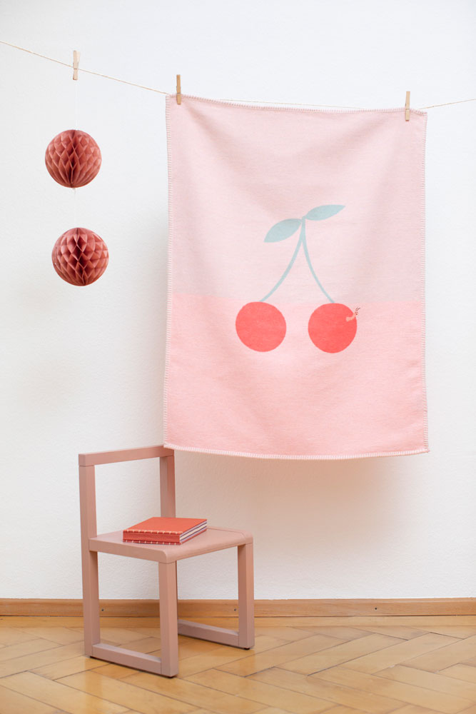 LILI baby blanket "cherries with worm" with embroidery in . Blanket made by David Fussenegger , a family-run mill in Austria.