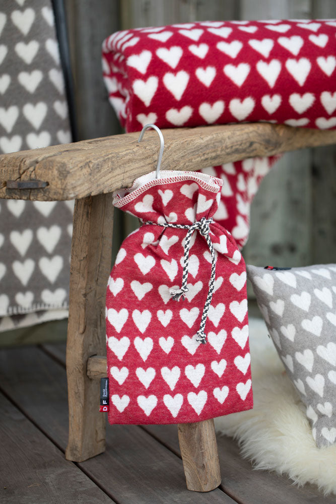 SILVRETTA warming bottle "hearts" in . Warming Bottle made by David Fussenegger , a family-run mill in Austria.