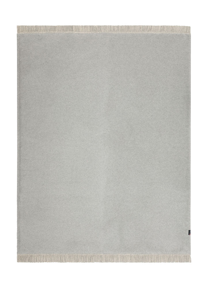 VIENNA throw solid with fringe in felt . Throw Blanket made by David Fussenegger , a family-run mill in Austria.