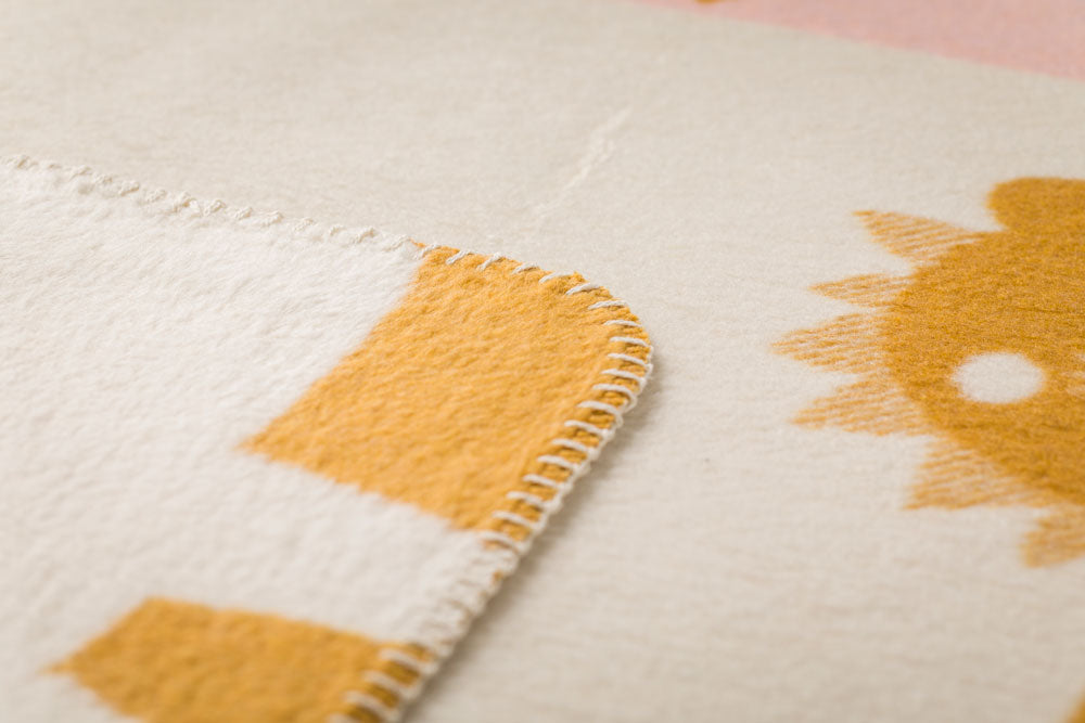 MILA baby blanket "lions in love" in . Blanket made by David Fussenegger , a family-run mill in Austria.