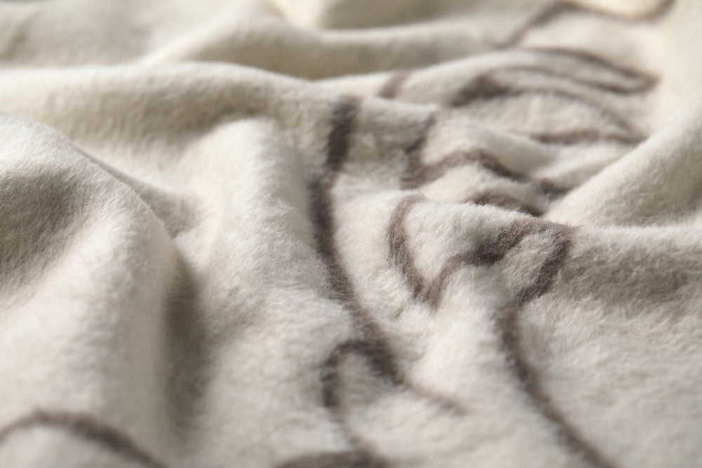 SAVONA throw "stag heads linear" in . Throw Blanket made by David Fussenegger , a family-run mill in Austria.