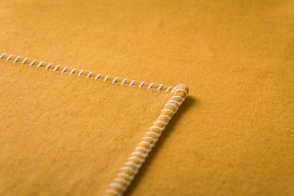 SYLT throw solid in . Throw Blanket made by David Fussenegger , a family-run mill in Austria.