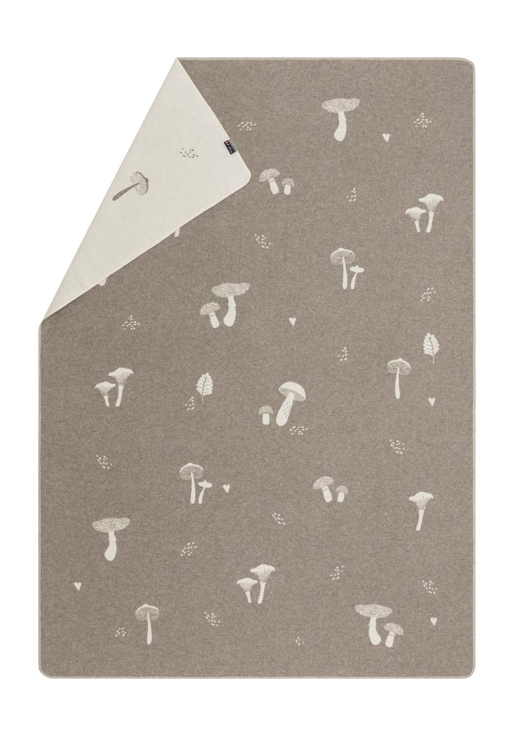 SILVRETTA throw "mushrooms'n more" in smoke . Throw Blanket made by David Fussenegger , a family-run mill in Austria.