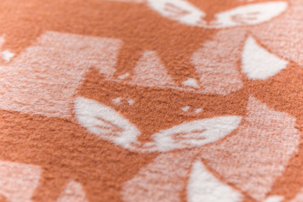 MILA baby blanket "pack of foxes" in . Blanket made by David Fussenegger , a family-run mill in Austria.