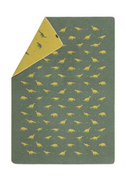 JUWEL kid blanket "dinosaurs allover" in ivy mustard . Blanket made by David Fussenegger , a family-run mill in Austria.