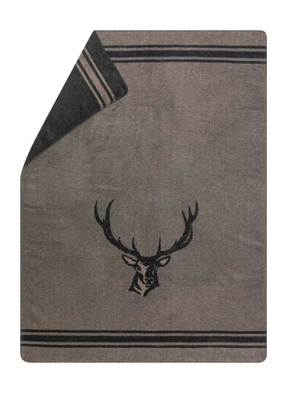 SAVONA throw "stag/antlers" in smoke . Throw Blanket made by David Fussenegger , a family-run mill in Austria.