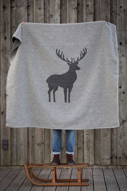 LUCA throw "centered deer" in . Throw Blanket made by David Fussenegger , a family-run mill in Austria.