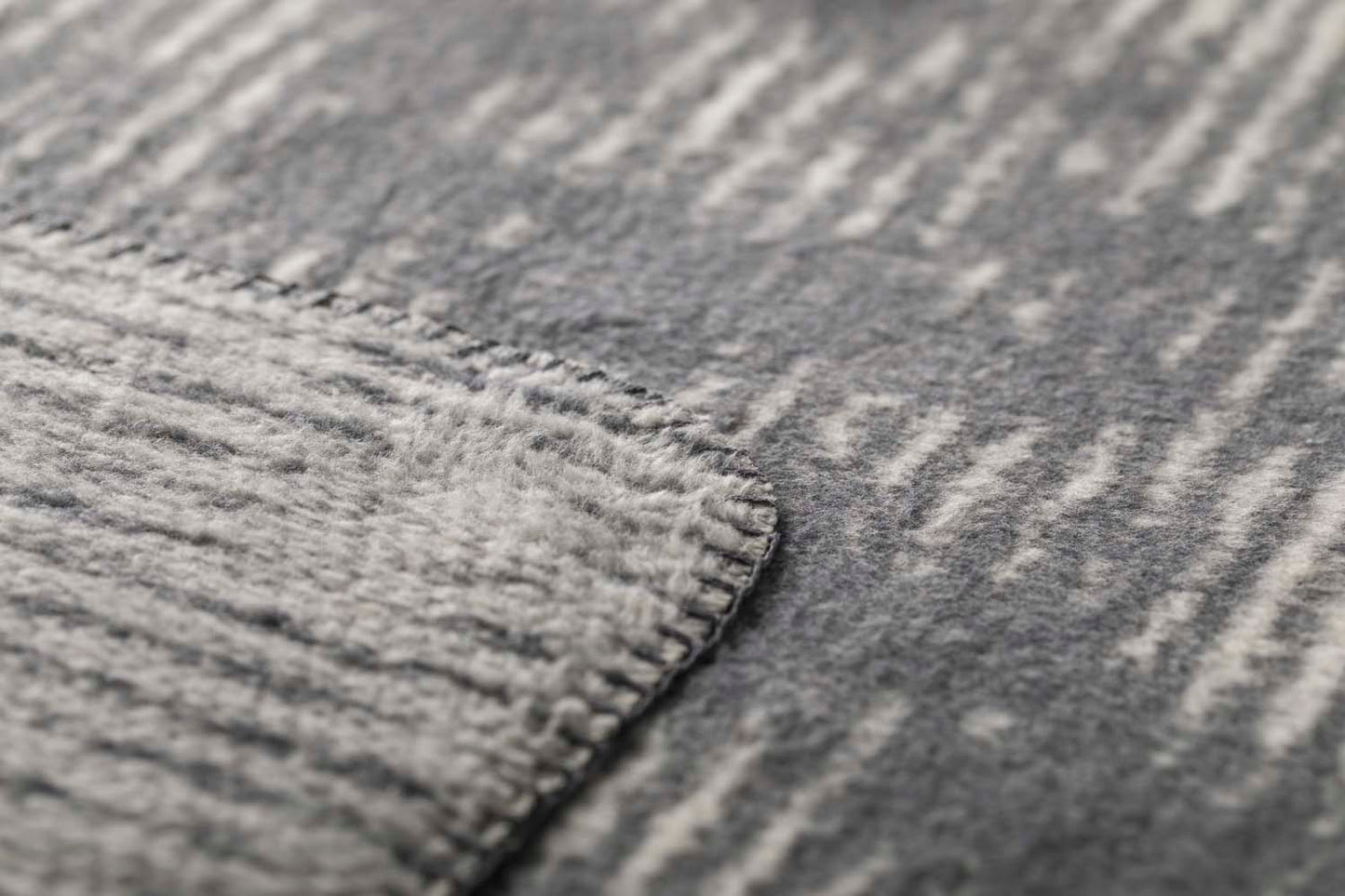 SAVONA throw "structures" in . Throw Blanket made by David Fussenegger , a family-run mill in Austria.