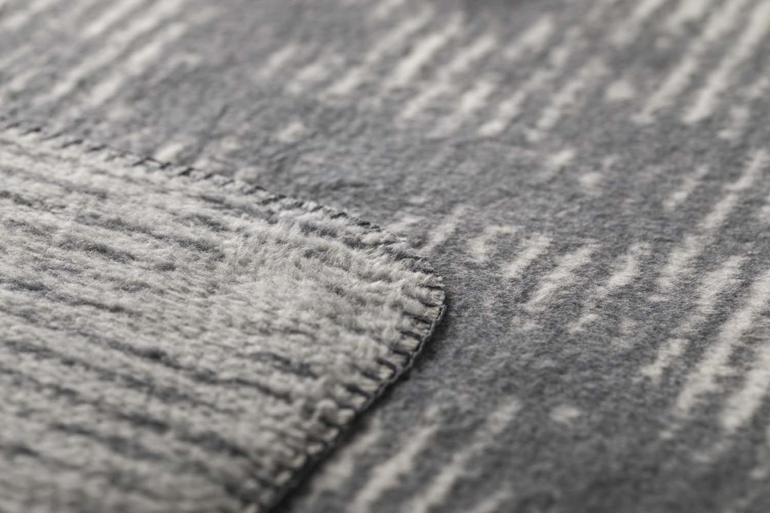 SAVONA throw "structures" in . Throw Blanket made by David Fussenegger , a family-run mill in Austria.
